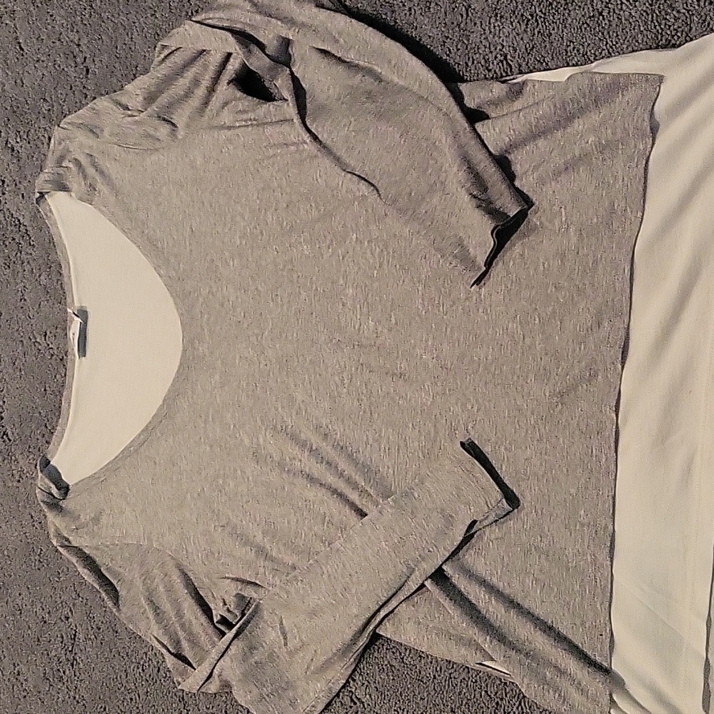 Vince V Neck Long Sleeve Shirt. Has a layered look.